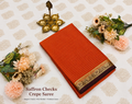 Saffron Orange Crepe Saree with Contrast Zari Border