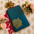 Teal Blue Semi Silk Saree with Gold Peacock Motif & Pink Tassels